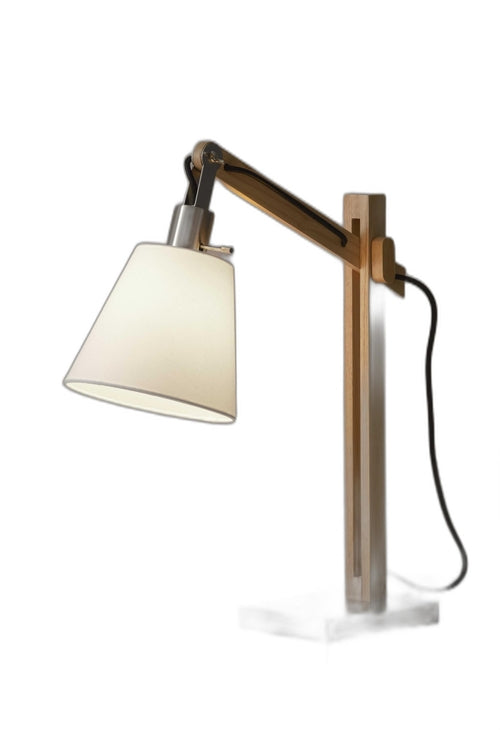 Natural wood table lamp with rustic hinges.