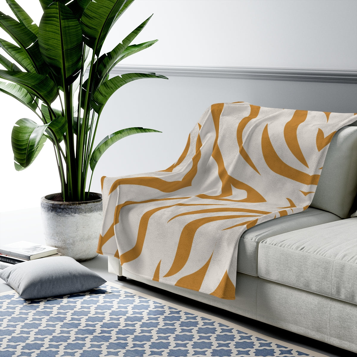 Beige throw with mustard tiger patterns