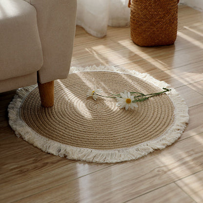 Round jute rug with white fringes