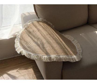 Round jute rug with white fringes