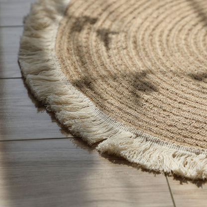 Round jute rug with white fringes